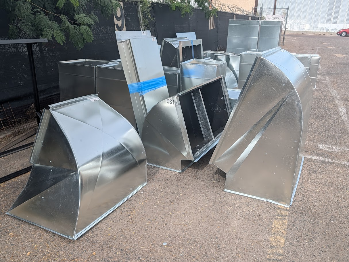 HVAC elbows and transitions staged outside