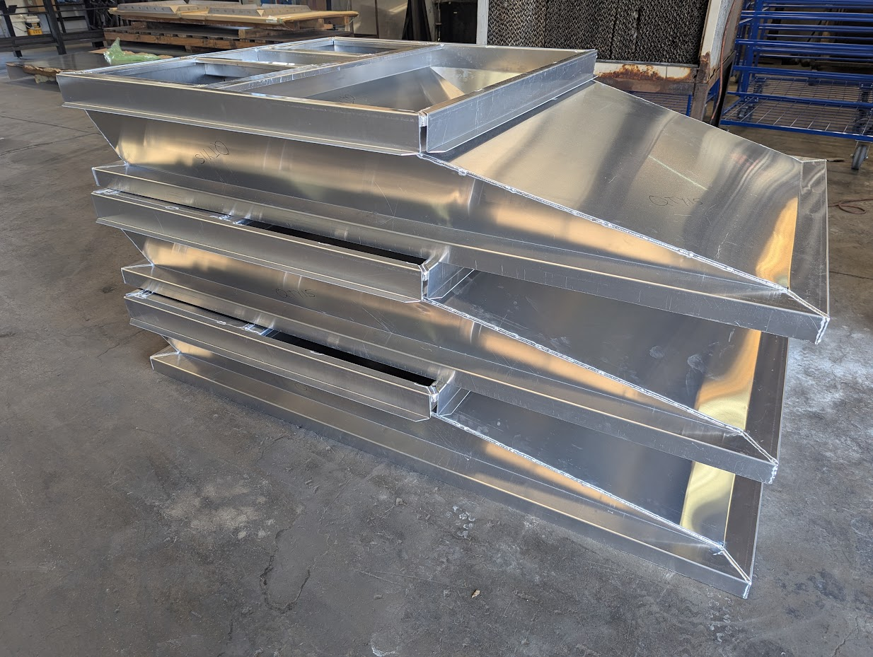 Custom galvanized curb adapters